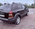 Чорний Хендай Туксон, об'ємом двигуна 1.98 л та пробігом 262 тис. км за 6850 $, фото 6 на Automoto.ua