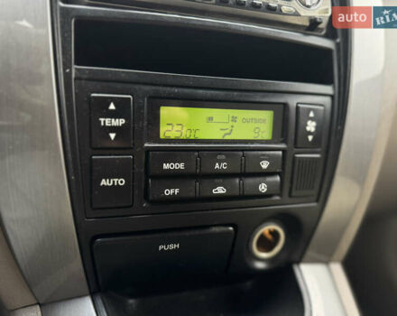 Черный Хендай Туксон, объемом двигателя 2.7 л и пробегом 220 тыс. км за 6400 $, фото 12 на Automoto.ua