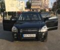 Черный Хендай Туксон, объемом двигателя 1.98 л и пробегом 252 тыс. км за 8150 $, фото 9 на Automoto.ua