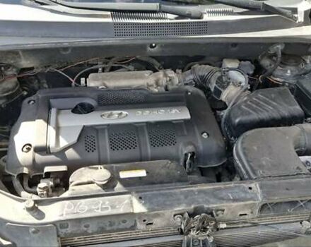 Черный Хендай Туксон, объемом двигателя 1.98 л и пробегом 193 тыс. км за 8000 $, фото 9 на Automoto.ua