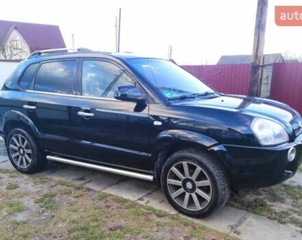 Черный Хендай Туксон, объемом двигателя 2 л и пробегом 208 тыс. км за 6950 $, фото 50 на Automoto.ua