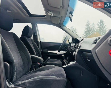 Черный Хендай Туксон, объемом двигателя 1.98 л и пробегом 252 тыс. км за 7300 $, фото 25 на Automoto.ua