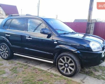 Черный Хендай Туксон, объемом двигателя 2 л и пробегом 208 тыс. км за 6950 $, фото 4 на Automoto.ua
