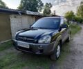 Черный Хендай Туксон, объемом двигателя 2 л и пробегом 238 тыс. км за 8200 $, фото 1 на Automoto.ua