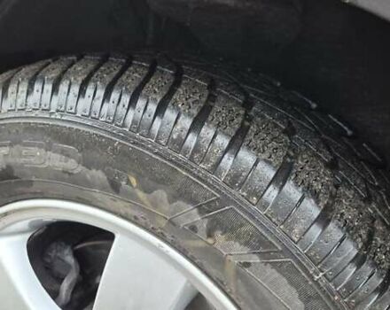 Черный Хендай Туксон, объемом двигателя 1.98 л и пробегом 230 тыс. км за 6390 $, фото 12 на Automoto.ua