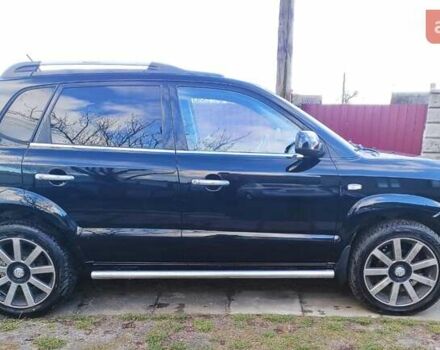 Черный Хендай Туксон, объемом двигателя 2 л и пробегом 208 тыс. км за 6950 $, фото 6 на Automoto.ua