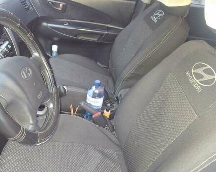 Черный Хендай Туксон, объемом двигателя 2 л и пробегом 224 тыс. км за 6800 $, фото 4 на Automoto.ua