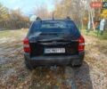 Черный Хендай Туксон, объемом двигателя 1.98 л и пробегом 192 тыс. км за 6900 $, фото 4 на Automoto.ua