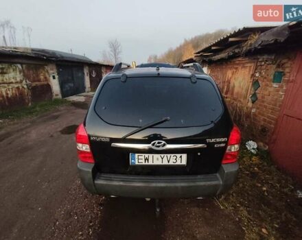 Черный Хендай Туксон, объемом двигателя 1.99 л и пробегом 370 тыс. км за 3300 $, фото 6 на Automoto.ua