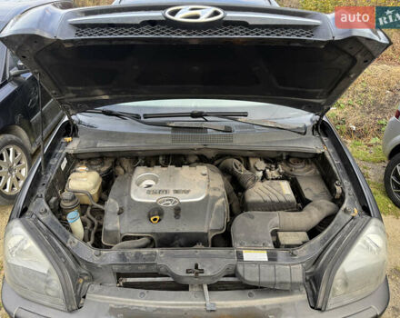 Черный Хендай Туксон, объемом двигателя 2 л и пробегом 211 тыс. км за 4444 $, фото 22 на Automoto.ua