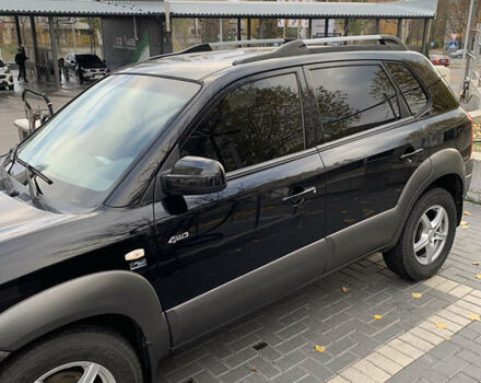 Черный Хендай Туксон, объемом двигателя 2 л и пробегом 219 тыс. км за 8400 $, фото 9 на Automoto.ua