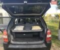 Черный Хендай Туксон, объемом двигателя 1.98 л и пробегом 179 тыс. км за 8000 $, фото 6 на Automoto.ua