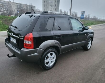 Черный Хендай Туксон, объемом двигателя 2 л и пробегом 180 тыс. км за 4500 $, фото 7 на Automoto.ua