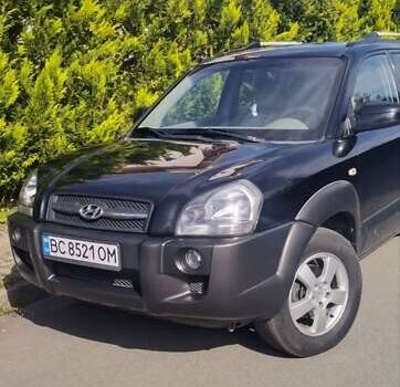 Чорний Хендай Туксон, об'ємом двигуна 1.99 л та пробігом 254 тис. км за 7800 $, фото 4 на Automoto.ua