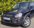 Чорний Хендай Туксон, об'ємом двигуна 1.99 л та пробігом 254 тис. км за 7800 $, фото 4 на Automoto.ua