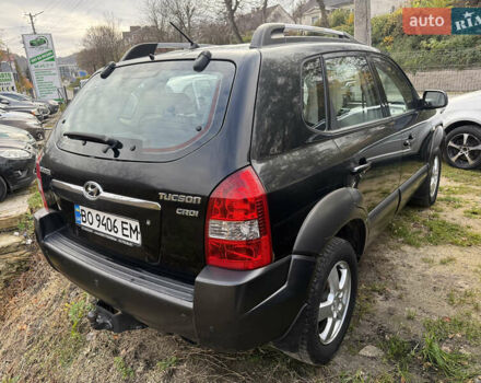 Черный Хендай Туксон, объемом двигателя 2 л и пробегом 211 тыс. км за 4444 $, фото 4 на Automoto.ua