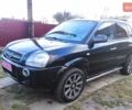 Черный Хендай Туксон, объемом двигателя 2 л и пробегом 208 тыс. км за 6950 $, фото 36 на Automoto.ua
