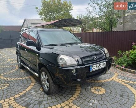 Чорний Хендай Туксон, об'ємом двигуна 1.98 л та пробігом 237 тис. км за 7500 $, фото 2 на Automoto.ua