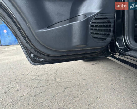Черный Хендай Туксон, объемом двигателя 1.98 л и пробегом 215 тыс. км за 8600 $, фото 12 на Automoto.ua
