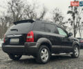 Черный Хендай Туксон, объемом двигателя 2 л и пробегом 257 тыс. км за 6800 $, фото 17 на Automoto.ua