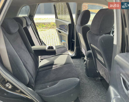 Черный Хендай Туксон, объемом двигателя 2 л и пробегом 255 тыс. км за 6900 $, фото 7 на Automoto.ua