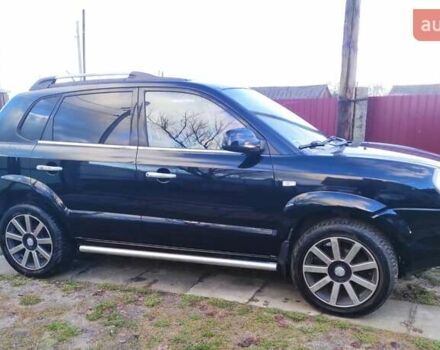 Черный Хендай Туксон, объемом двигателя 2 л и пробегом 208 тыс. км за 6950 $, фото 51 на Automoto.ua