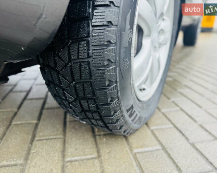 Черный Хендай Туксон, объемом двигателя 1.98 л и пробегом 252 тыс. км за 7300 $, фото 10 на Automoto.ua