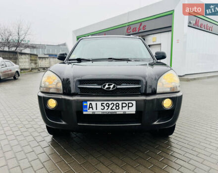 Черный Хендай Туксон, объемом двигателя 1.98 л и пробегом 252 тыс. км за 7300 $, фото 2 на Automoto.ua