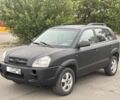 Чорний Хендай Туксон, об'ємом двигуна 2 л та пробігом 260 тис. км за 3750 $, фото 1 на Automoto.ua