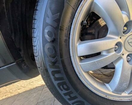 Черный Хендай Туксон, объемом двигателя 1.98 л и пробегом 226 тыс. км за 6500 $, фото 14 на Automoto.ua