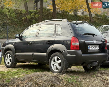 Черный Хендай Туксон, объемом двигателя 2 л и пробегом 211 тыс. км за 4444 $, фото 5 на Automoto.ua