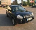 Черный Хендай Туксон, объемом двигателя 2 л и пробегом 253 тыс. км за 7500 $, фото 1 на Automoto.ua
