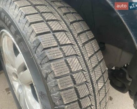 Черный Хендай Туксон, объемом двигателя 2 л и пробегом 190 тыс. км за 7500 $, фото 5 на Automoto.ua