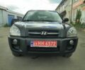 Черный Хендай Туксон, объемом двигателя 2 л и пробегом 252 тыс. км за 7300 $, фото 2 на Automoto.ua