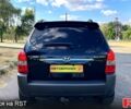Черный Хендай Туксон, объемом двигателя 2 л и пробегом 241 тыс. км за 7800 $, фото 4 на Automoto.ua