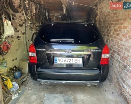 Чорний Хендай Туксон, об'ємом двигуна 1.98 л та пробігом 137 тис. км за 7600 $, фото 2 на Automoto.ua