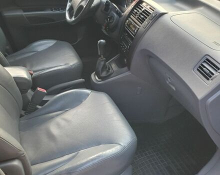 Черный Хендай Туксон, объемом двигателя 2 л и пробегом 137 тыс. км за 7499 $, фото 14 на Automoto.ua