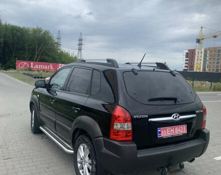 Черный Хендай Туксон, объемом двигателя 2 л и пробегом 270 тыс. км за 6300 $, фото 6 на Automoto.ua