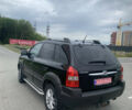 Черный Хендай Туксон, объемом двигателя 2 л и пробегом 270 тыс. км за 6300 $, фото 6 на Automoto.ua