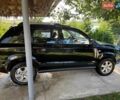 Чорний Хендай Туксон, об'ємом двигуна 1.98 л та пробігом 137 тис. км за 7600 $, фото 4 на Automoto.ua