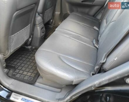 Черный Хендай Туксон, объемом двигателя 2 л и пробегом 208 тыс. км за 6950 $, фото 20 на Automoto.ua