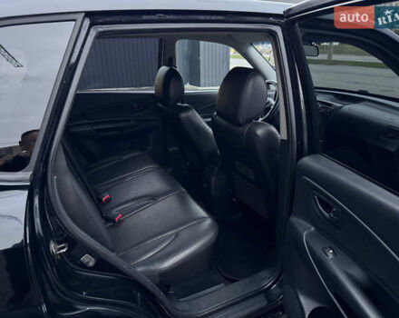 Хендай Туксон 2005 у Полтаві на Automoto.ua Чорний Хендай Туксон, об'ємом двигуна 1.98 л та пробігом 175 тис. км за 7700 $, фото 17 на Automoto.ua