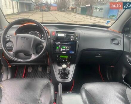 Черный Хендай Туксон, объемом двигателя 2 л и пробегом 190 тыс. км за 7500 $, фото 8 на Automoto.ua