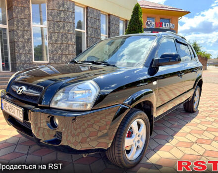 Чорний Хендай Туксон, об'ємом двигуна 2 л та пробігом 226 тис. км за 7000 $, фото 6 на Automoto.ua