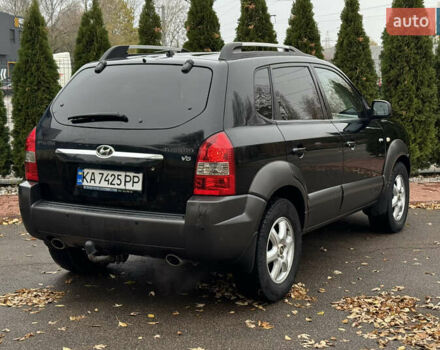 Черный Хендай Туксон, объемом двигателя 2.7 л и пробегом 220 тыс. км за 6400 $, фото 3 на Automoto.ua