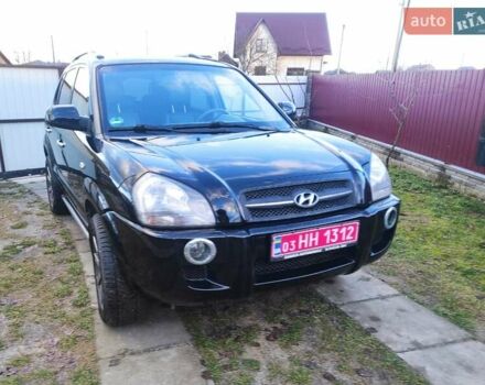 Черный Хендай Туксон, объемом двигателя 2 л и пробегом 208 тыс. км за 6950 $, фото 3 на Automoto.ua