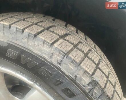 Черный Хендай Туксон, объемом двигателя 2 л и пробегом 190 тыс. км за 7500 $, фото 4 на Automoto.ua