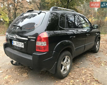 Черный Хендай Туксон, объемом двигателя 2 л и пробегом 261 тыс. км за 6500 $, фото 5 на Automoto.ua