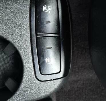 Черный Хендай Туксон, объемом двигателя 1.98 л и пробегом 230 тыс. км за 6390 $, фото 17 на Automoto.ua