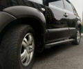 Чорний Хендай Туксон, об'ємом двигуна 1.98 л та пробігом 225 тис. км за 6600 $, фото 4 на Automoto.ua